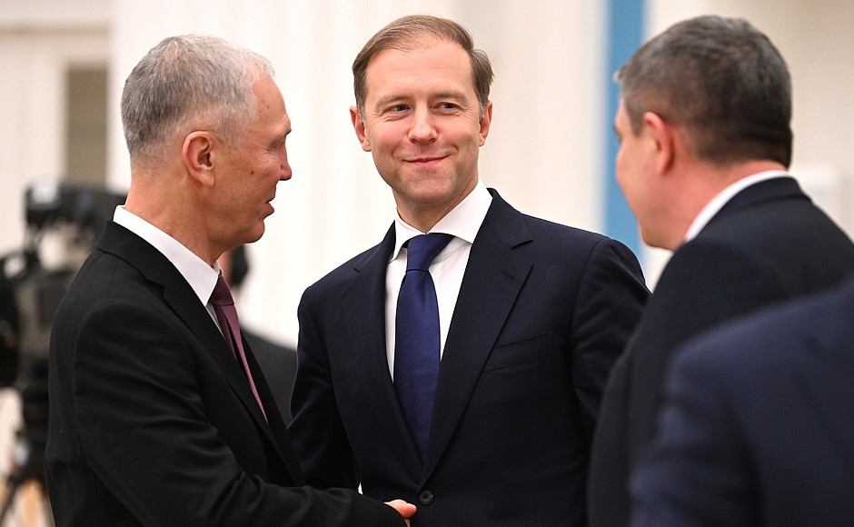 Deputy Prime Minister and Minister of Industry and Trade Denis Manturov, centre, before a meeting on the socioeconomic development of the new Russian regions.