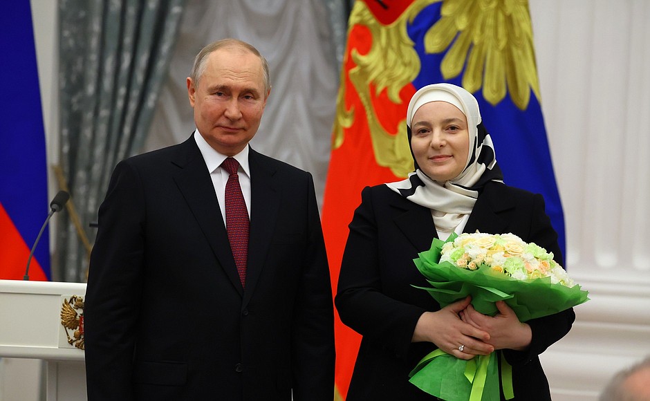 Ceremony for presenting state decorations. The title of Mother Heroine was awarded to Medni Kadyrova.