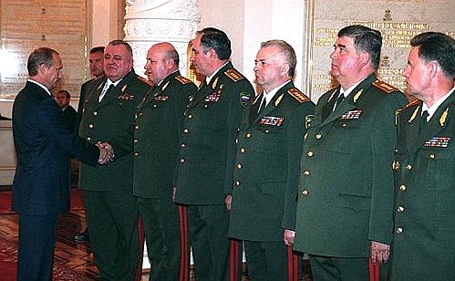 President Putin meeting with top officers promoted to new positions or special military ranks.