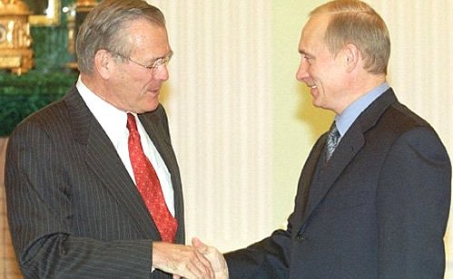 President Putin with US Defence Secretary Donald Rumsfeld.