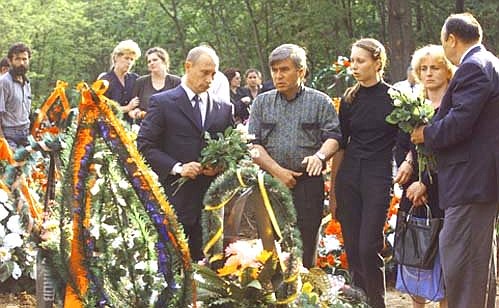 President Putin with relatives of the victims of the plane crash over Germany.