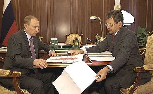 President Putin meeting with Emergency Situations Minister Sergei Shoigu.