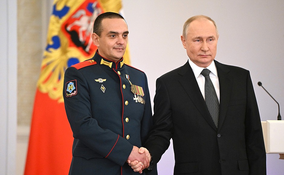 Presentation of Gold Star medals to Heroes of Russia. With Private Alexander Kornilov.