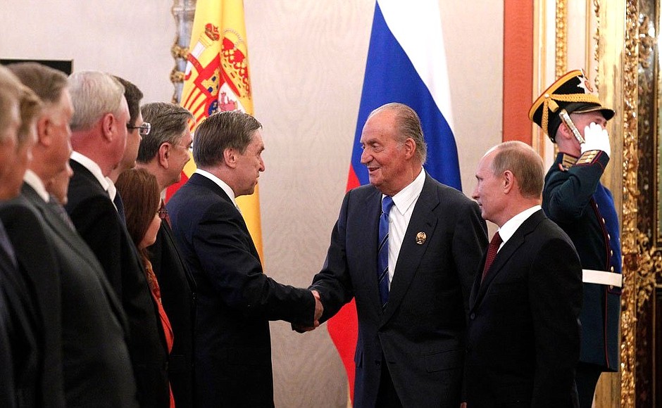 Before meeting with representatives of Russian and Spanish business communities.