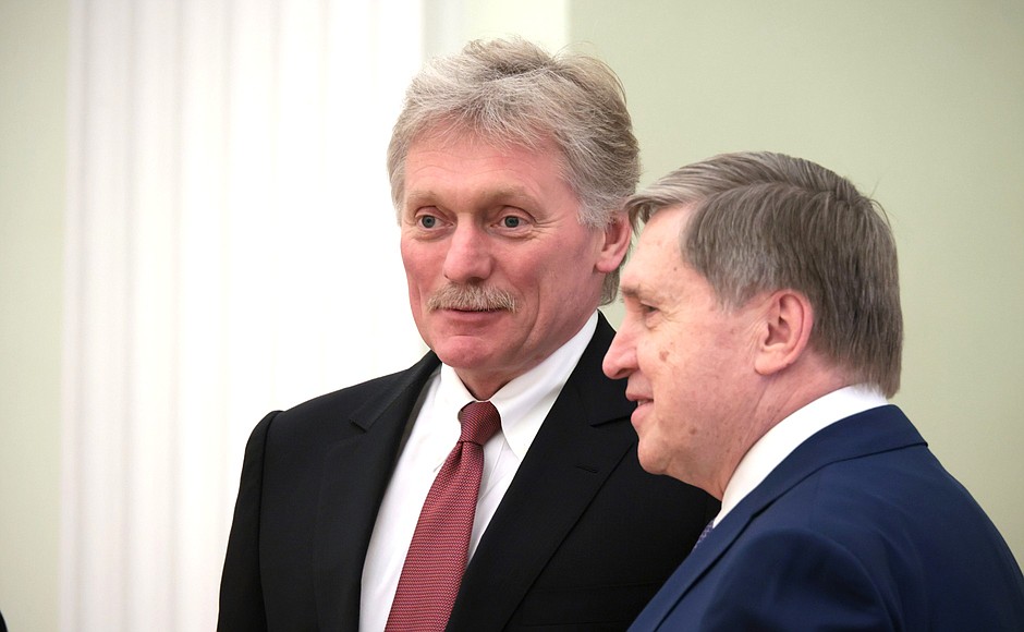 Deputy Chief of Staff of the Presidential Executive Office, Presidential Press Secretary Dmitry Peskov and Aid to the President Yury Ushakov, right, before the talks.