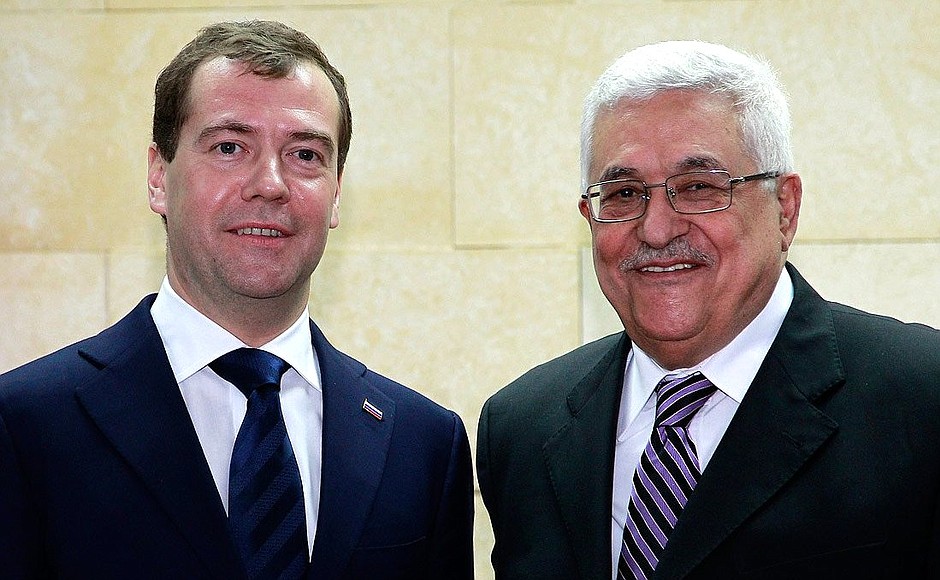 With President of Palestinian Authority Mahmoud Abbas.
