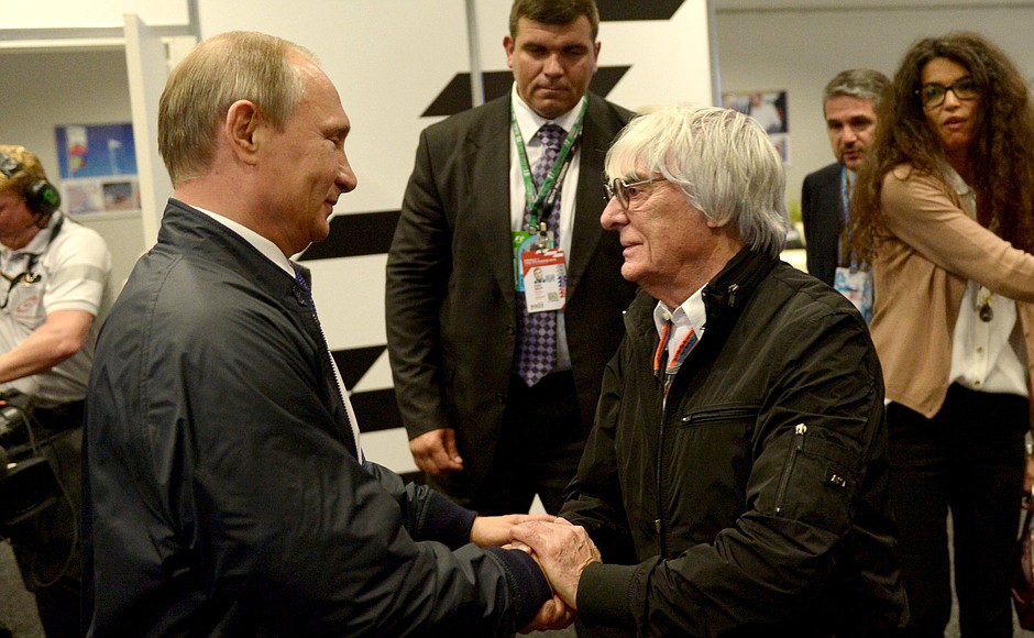 With Formula 1 President Bernie Ecclestone.