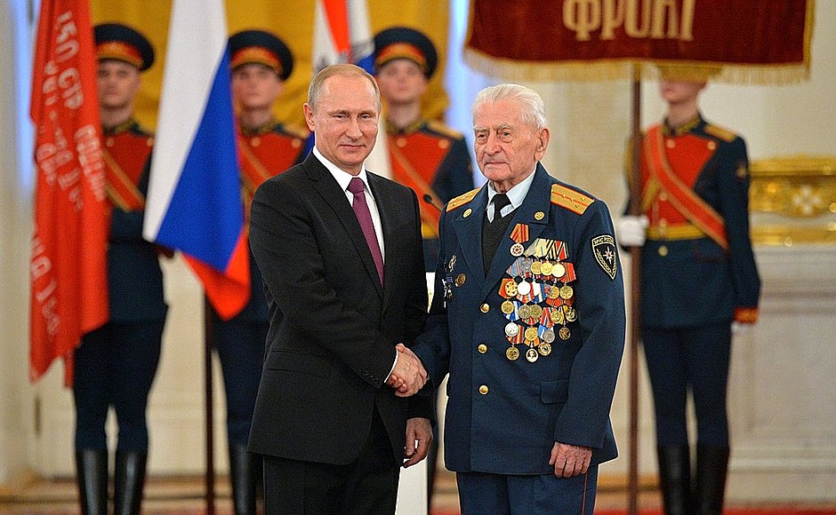 Ceremony awarding Great Patriotic War veterans the 70th Anniversary of Victory in the 1941–1945 Great Patriotic War jubilee medal. With Grigory Yurkin, who took part in the defence of Leningrad.