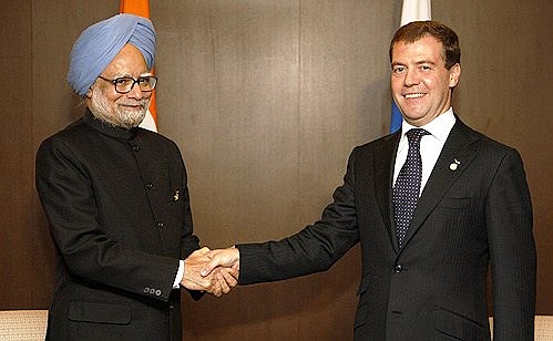 С Премьер-министром Индии Манмоханом Сингхом.