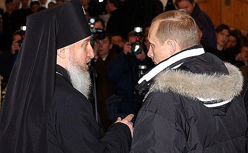President Vladimir Putin with Archbishop of Tobolsk and Tyumen Dimitry.