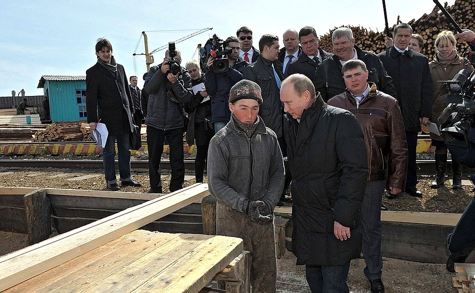During the visit to Sergei Kukhtin's logging company.