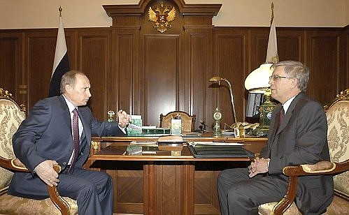 President Vladimir Putin meeting the Central Bank Chairman Sergei Ignatyev.