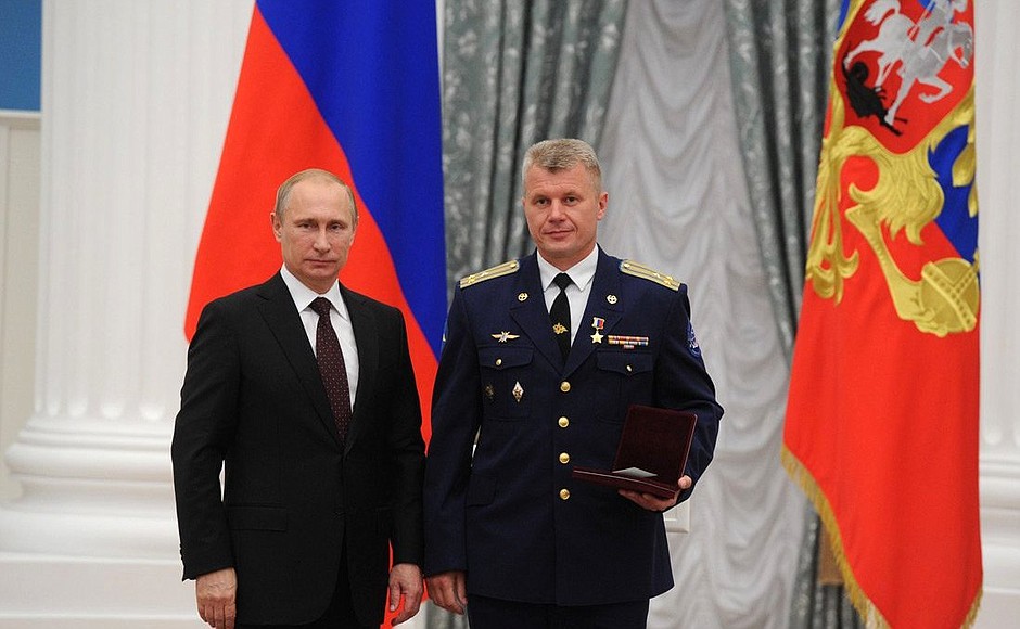 Presenting Russian Federation state decorations. The Hero of the Russian Federation title and honorary title Pilot-Cosmonaut of the Russian Federation is conferred on pilot-cosmonaut Oleg Novitsky.