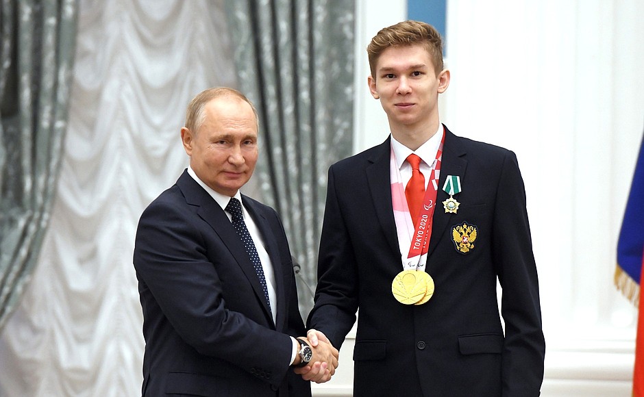 Presenting state decorations to winners of the 2020 Summer Paralympic Games in Tokyo. Bogdan Mozgovoi, two-time swimming champion of the Paralympics, receives the Order of Friendship.
