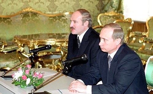 With President of Belarus Aleksandr Lukashenko at a joint news conference following the first session of The Supreme State Council of Russia and Belarus.