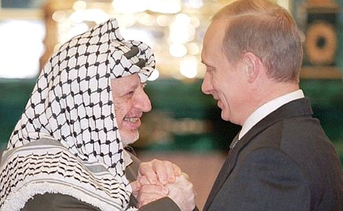 President Vladimir Putin with Palestinian National Authority leader Yasser Arafat.