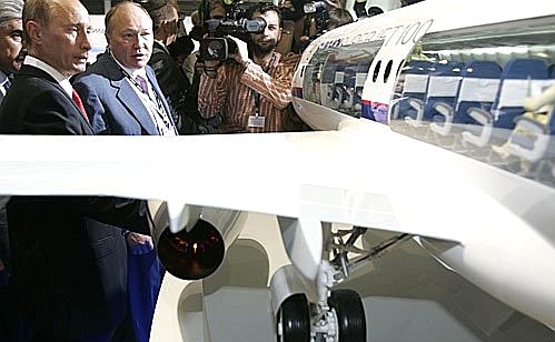 M. GROMOV FLIGHT RESEARCH INSTITUTE, ZHUKOVSKY AIR BASE, MOSCOW REGION. 8th International Aviation and Space Salon MAKS-2007. At the Civil Aviation, Military Transport Aviation, International Cooperation and Components booth presented by the Russian Associated Aviation Construction Corporation. Near the stand of the Sukhoi Superjet 100. Chairman of the Corporation\'s management board Alexei Fedorov, Vice President of the Corporation and Sukhoi General Director Mikhail Pogosian giving explanations.