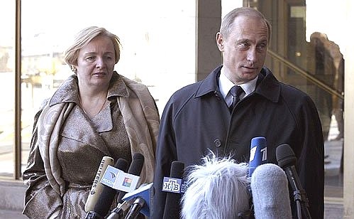 President Vladimir Putin speaking with journalists after voting in the presidential election.
