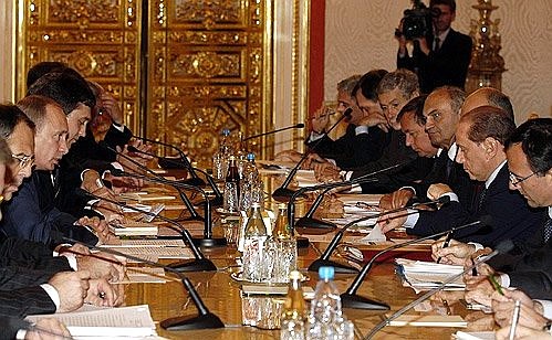 Talks with Italian Prime Minister Silvio Berlusconi in an enlarged meeting.