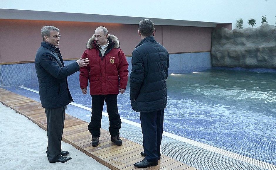 During visit to water park for alpine ski resort guests. With Deputy Prime Minister Dmitry Kozak (right) and Sberbank CEO German Gref.