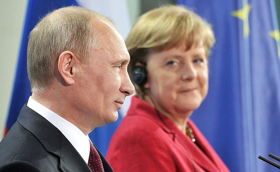 At a news conference following Russian-German talks. With Federal Chancellor of Germany Angela Merkel.