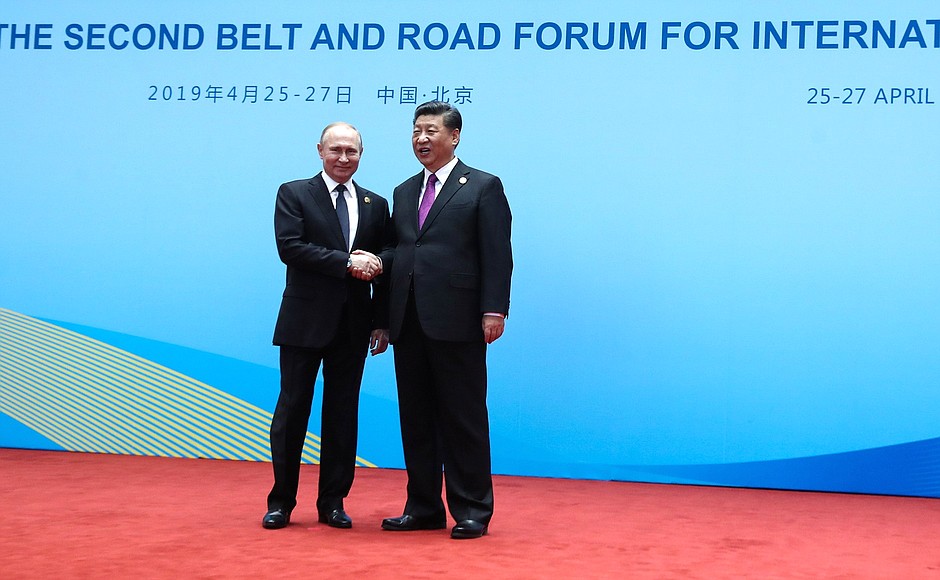 With President of the People's Republic of China Xi Jinping before a roundtable discussion at the Belt and Road Forum for International Cooperation.