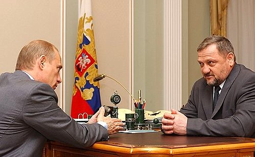 President Putin meeting with the head of the Chechen Administration, Akhmad Kadyrov.