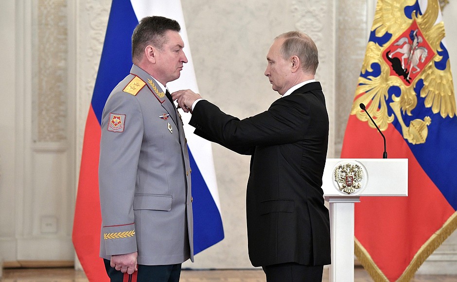 Meeting with service personnel who took part in the anti-terrorist operation in Syria. Lieutenant General Alexander Lapin has received the Order of St. George, IV degree.