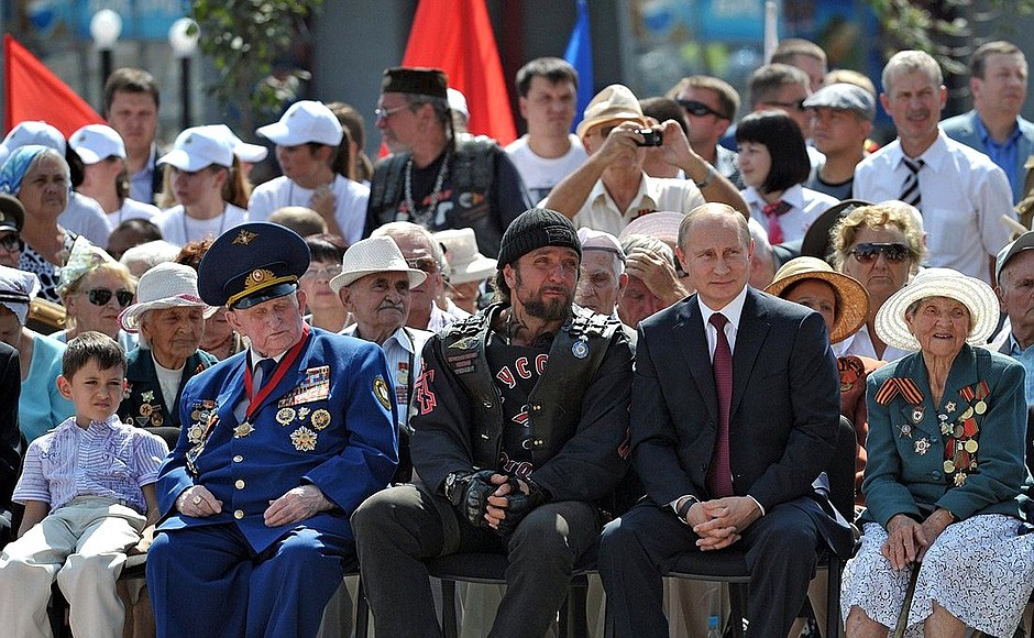 At the unveiling ceremony of the restored Children’s Dance fountain. To the President’s left is Alexander Zaldostanov, leader of a nationwide motorcycle club.