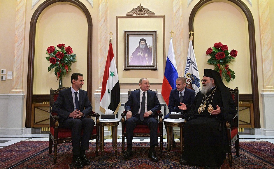Meeting with Patriarch John X of Antioch and All the East. Left, Syrian President Bashar al-Assad.