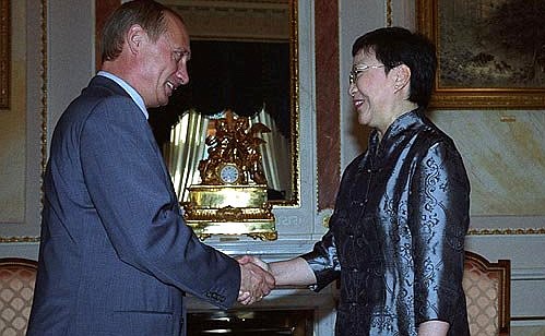 President Putin with Deng Rong, the daughter of chief Chinese reformer Deng Xiaoping.