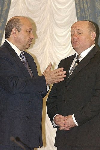 Before the meeting with executives of the Russian aerospace industry. Left to right: Security Council Secretary Igor Ivanov and Prime Minister Mikhail Fradkov.
