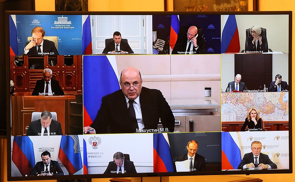 Participants in a meeting with Government members (via videoconference).