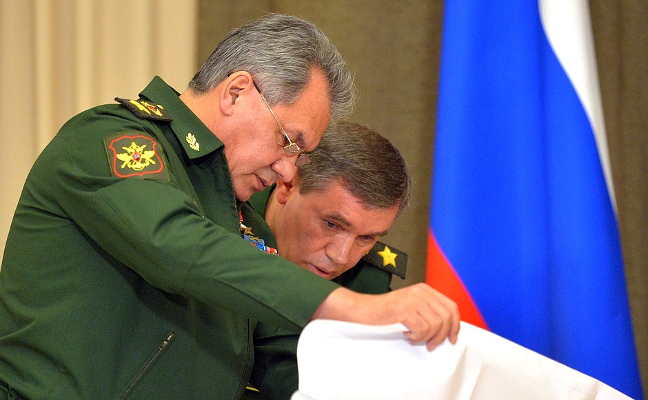 Defence Minister Sergei Shoigu and Chief of Russian Armed Forces General Staff and First Deputy Defence Minister Valery Gerasimov before the start of a meeting on Armed Forces development.