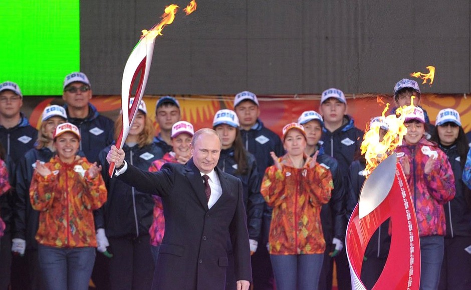 Vladimir Putin launches the Olympic flame’s relay across Russia.