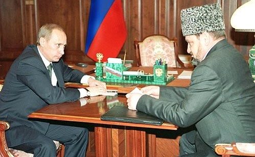 President Putin meeting with Akhmat Kadyrov, the head of the Chechen administration.