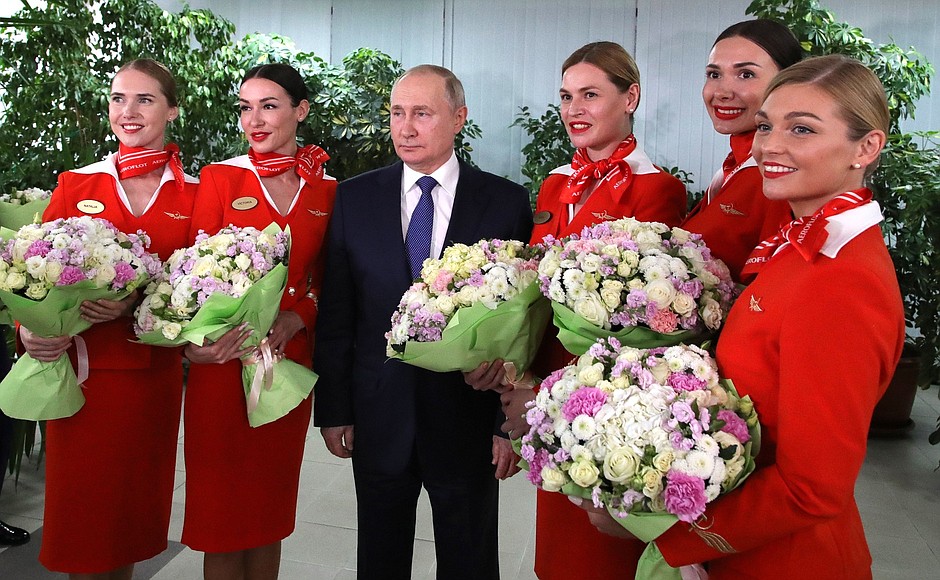 With female representatives of Russian airlines’ flight personnel.