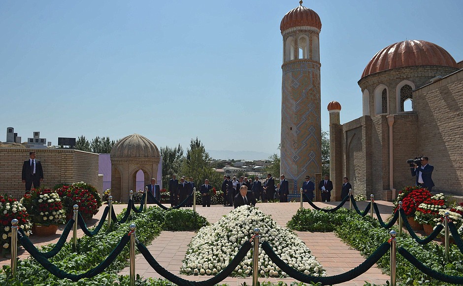 Laying flowers at the tomb of Islam Karimov.