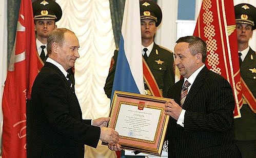 Ceremony conferring the honorary title of City of Military Glory on Belgorod, Oryol and Kursk. Mayor of Belgorod Vasily Potryasayev receives the official document.