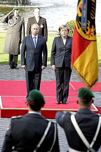 Official welcome ceremony. With German Chancellor Angela Merkel.