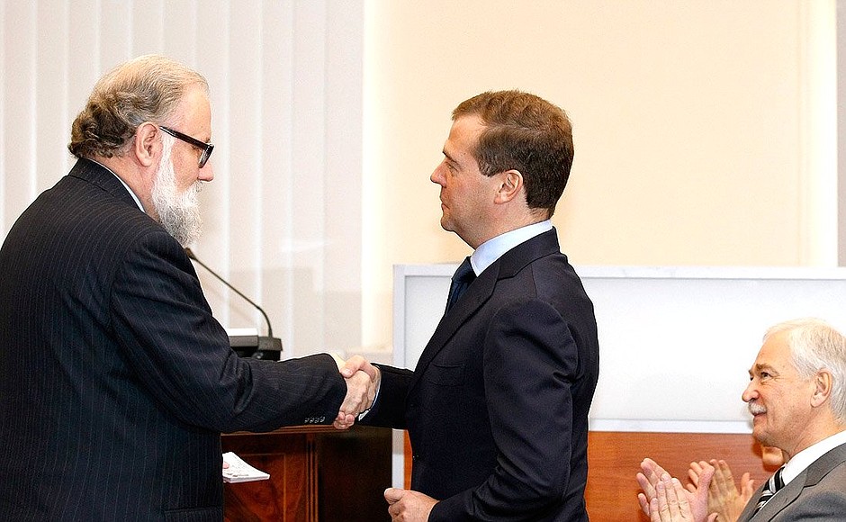 Central Election Commission Chairman Vladimir Churov presented Dmitry Medvedev with a certificate of a State Duma candidate.