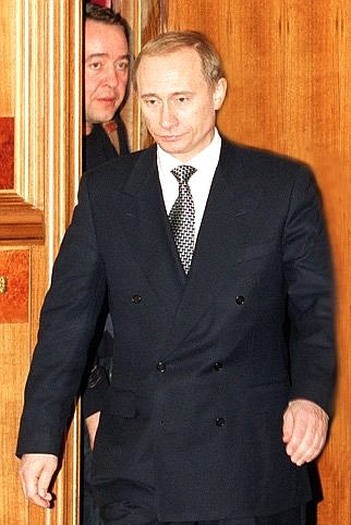 Acting President Vladimir Putin before an extraordinary government meeting.