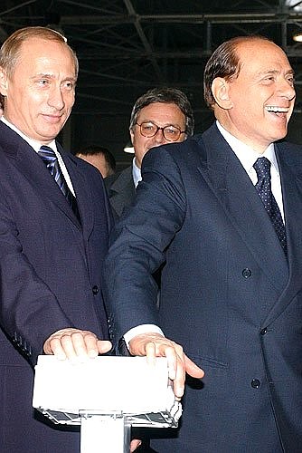 President Putin with Italian Prime Minister Silvio Berlusconi at the launching of the production line for washing machines.