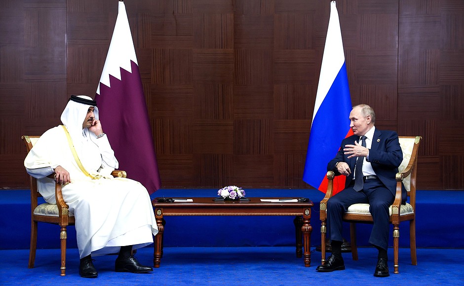 With Emir of Qatar Sheikh Tamim bin Hamad Al Thani.