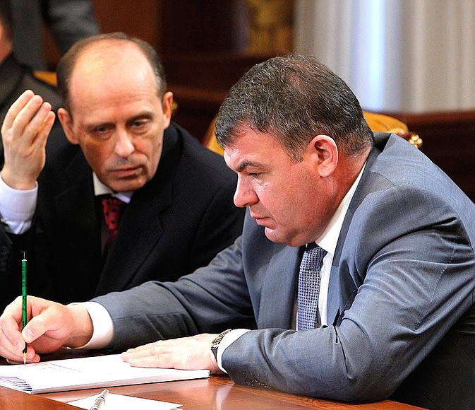 Director of the Federal Security Service Alexander Bortnikov (left), and Defence Minister Anatoly Serdyukov before the start of a meeting on security issues.