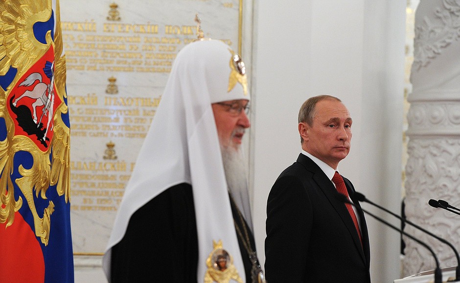 With Patriarch of Moscow and All Russia Kirill at a reception to mark 1000 years since the death of St. Vladimir, Equal-to-the-Apostles.