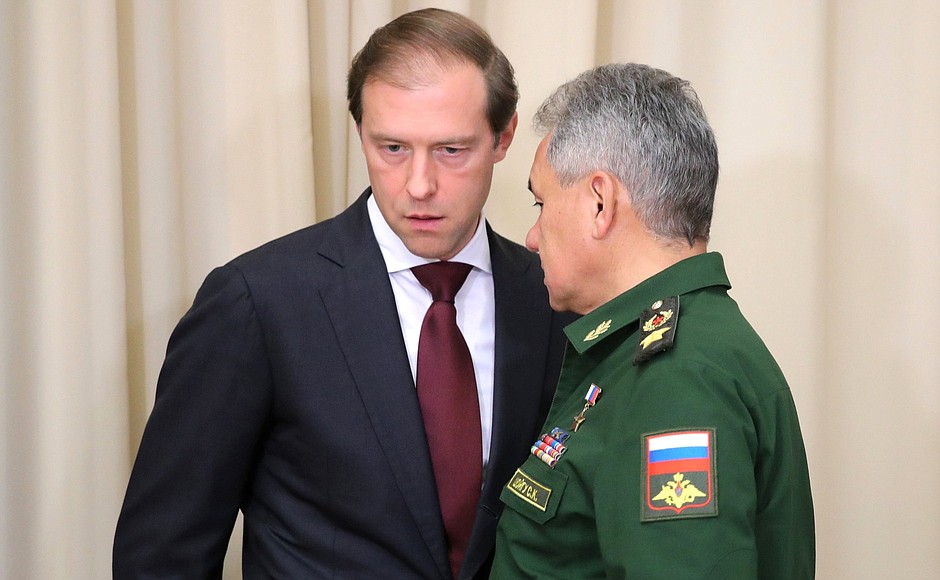 Minister of Industry and Trade Denis Manturov (left) and Defence Minister Sergei Shoigu before the meeting with Defence Ministry and defence industry senior officials and heads of ministries and regions