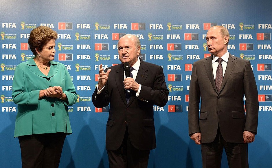 With President of Brazil Dilma Rousseff and FIFA President Joseph Blatter at the ceremony handing over the FIFA World Cup host country rights from Brazil to Russia.
