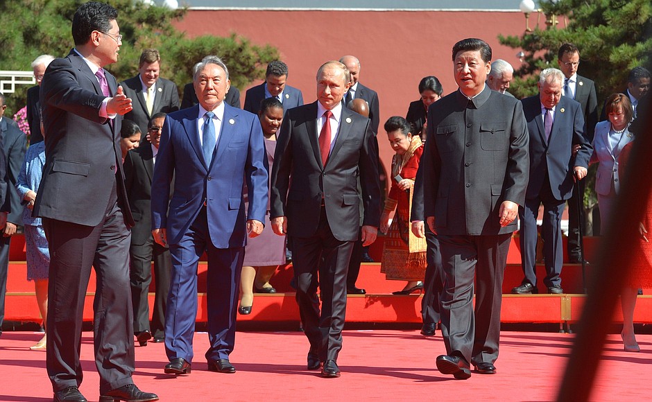 Before military parade to mark the 70th anniversary of the Chinese people’s victory in the War of Resistance against Japan and the end of World War II. With President of Kazakhstan Nursultan Nazarbayev (left) and President of China Xi Jinping.
