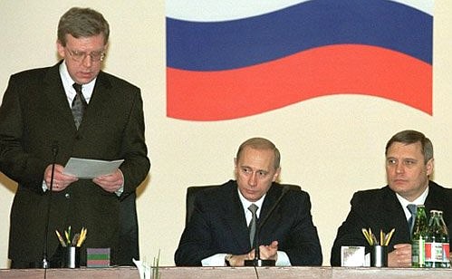 An expanded joint board meeting of the Finance Ministry and the Ministry of Taxes and Levies. President Putin with Prime Minister Mikhail Kasyanov (right) and Deputy Prime Minister and Finance Minister Alexei Kudrin.